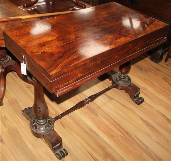 An early 19th century rosewood folding bagatelle table, W.3ft 4in.